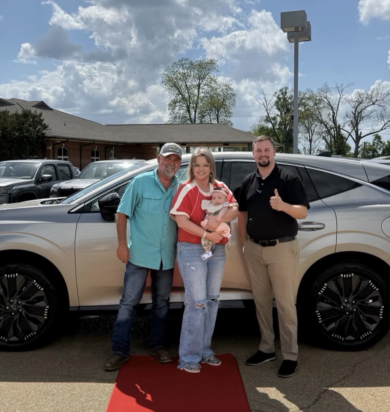 Happy customer with new vehicle
