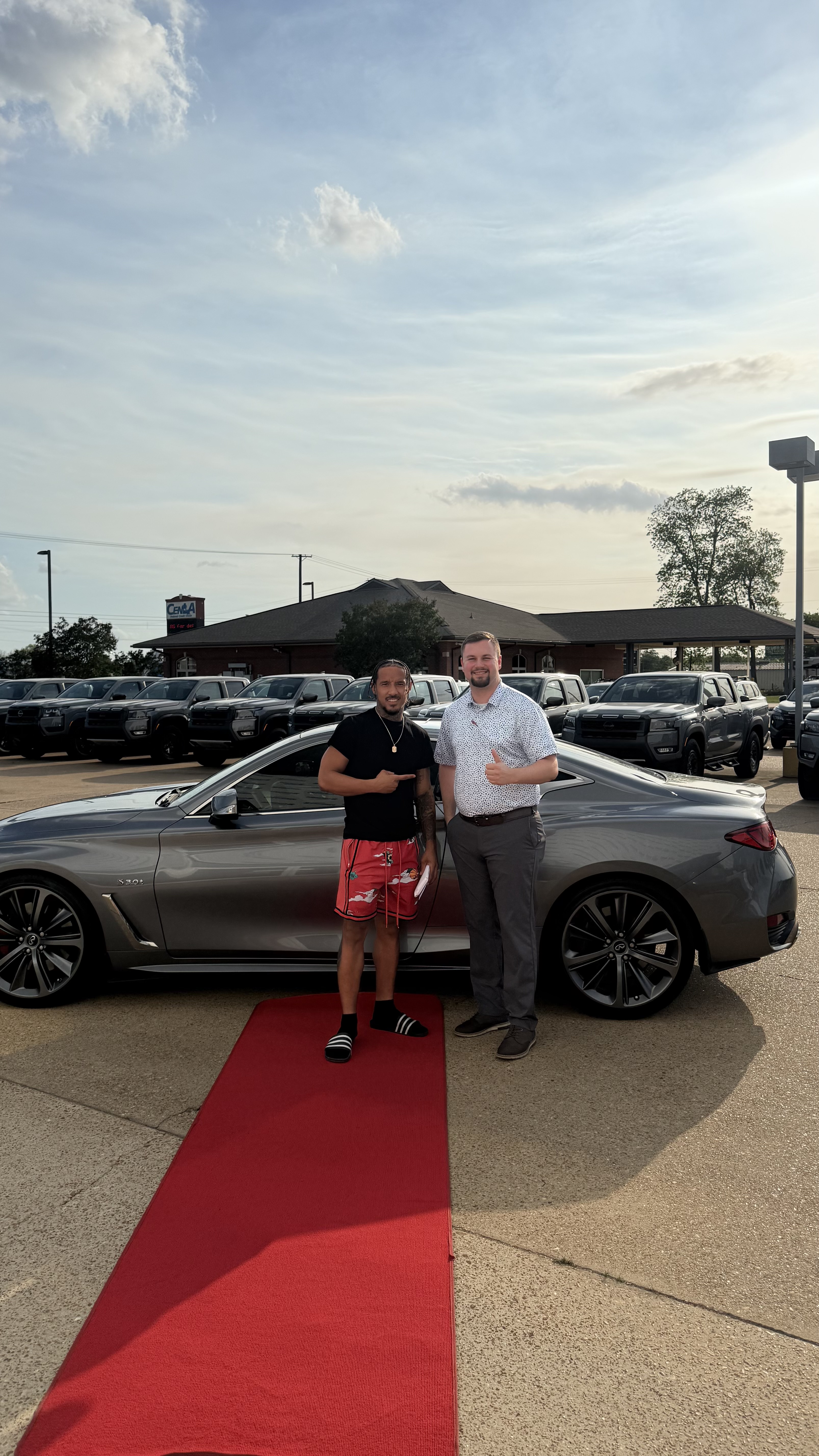 Happy customer with new vehicle